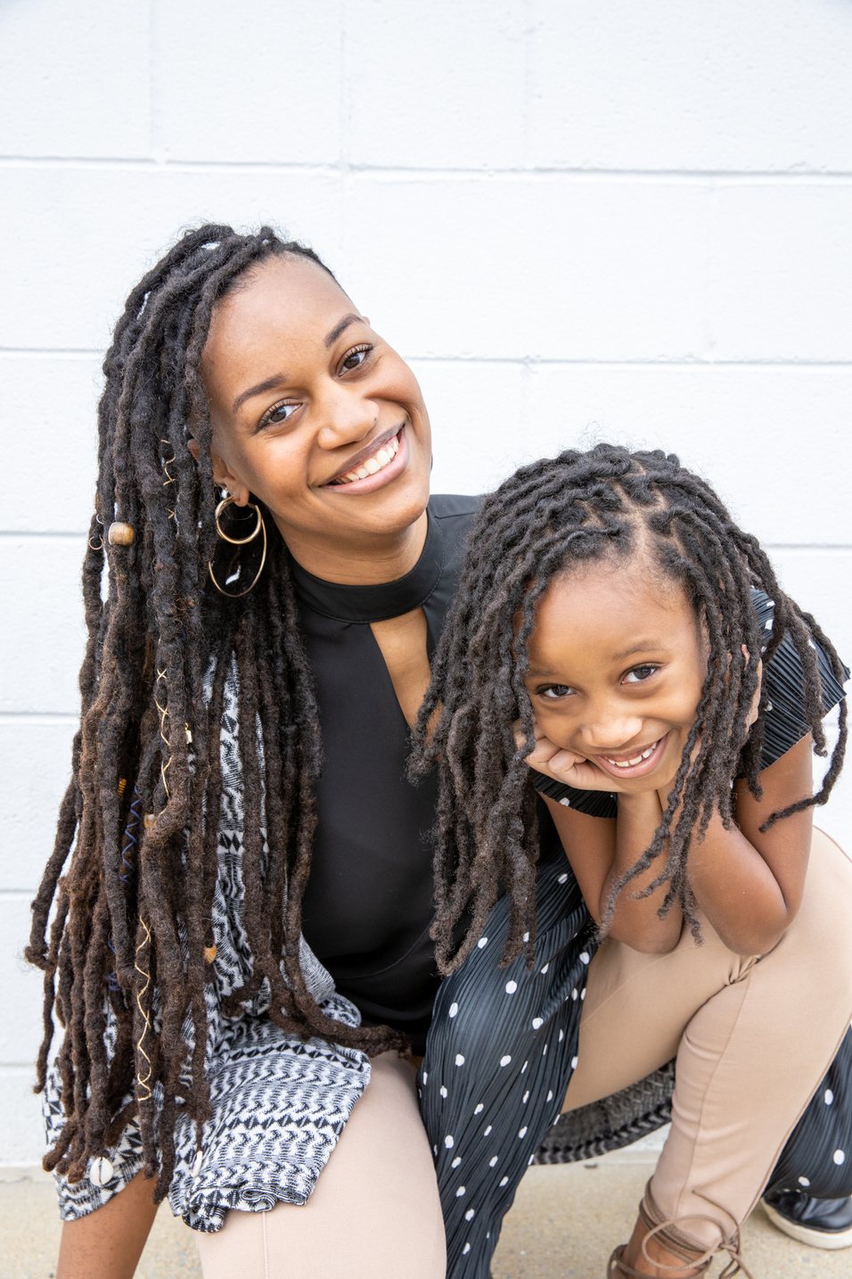 Smiling Mother and Daughter