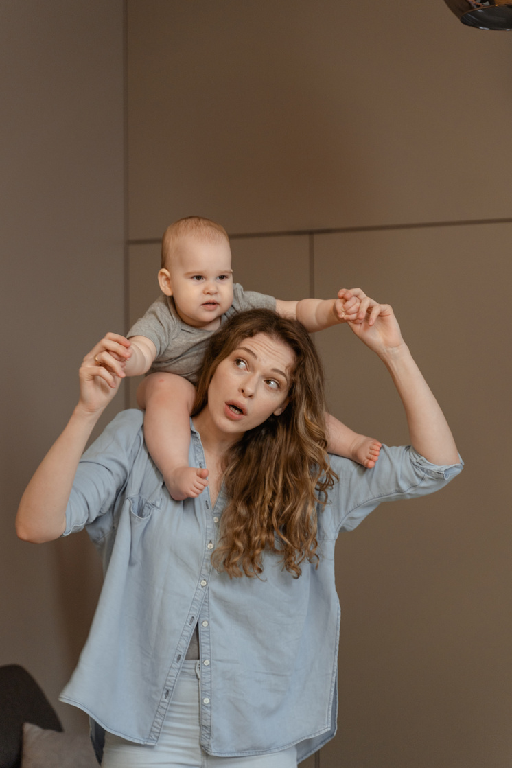 Mother Carrying her Baby